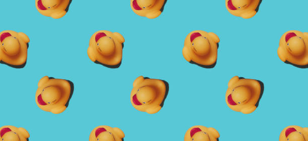istock Yellow rubber ducks on blue background. Top view, flat lay. Bath concept. Collage 1323303915