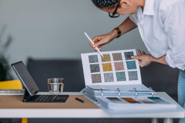 istock Young Woman With Digital Tablet Choosing Colour Palette For New Flat 1323304734