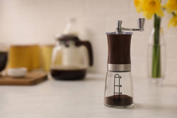 istock Manual coffee grinder on counter in kitchen 1323307581