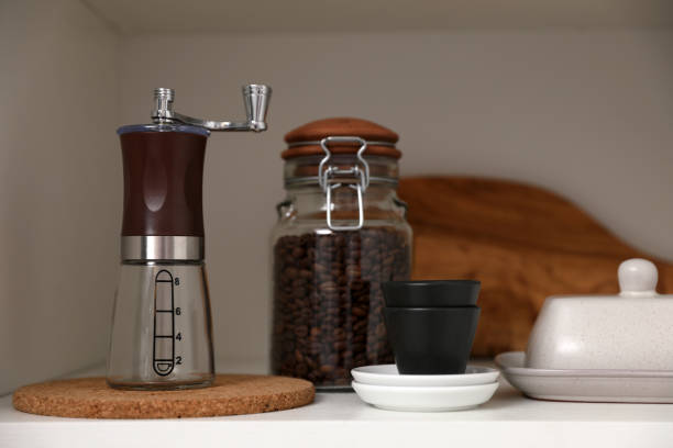 istock Manual coffee grinder on shelf in kitchen 1323307610