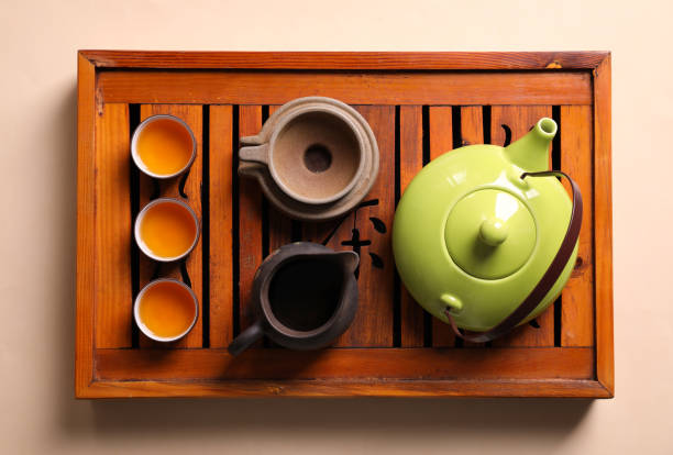 istock Beautiful set for traditional tea ceremony on beige background, top view 1323307854