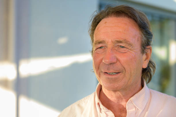 istock Happy middle-aged man with a wide beaming smile 1323308000