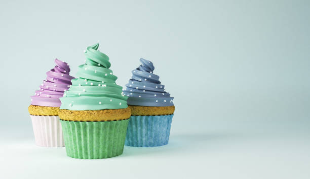istock Colorful cupcakes on pastel background, birthday cake, 3d rendering 1323308269