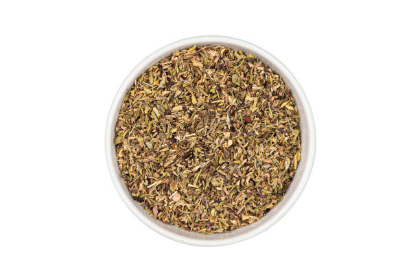 istock thyme seasoning spice in bowl on white background 1323308997