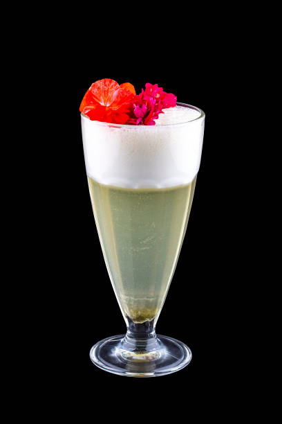 istock Pear cocktail, decorated with flowers on a dark background. Isolated 1323319804