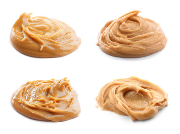 istock Set with delicious peanut butter on white background 1323320408