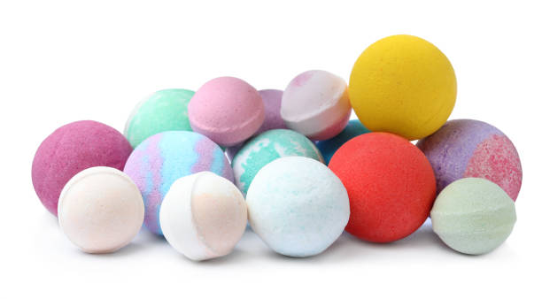 istock Many colorful bath bombs on white background 1323322086