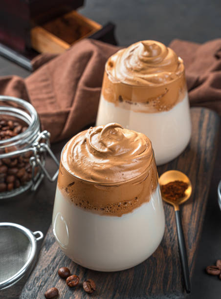 istock Coffee with milk and whipped foam on a brown background 1323322992