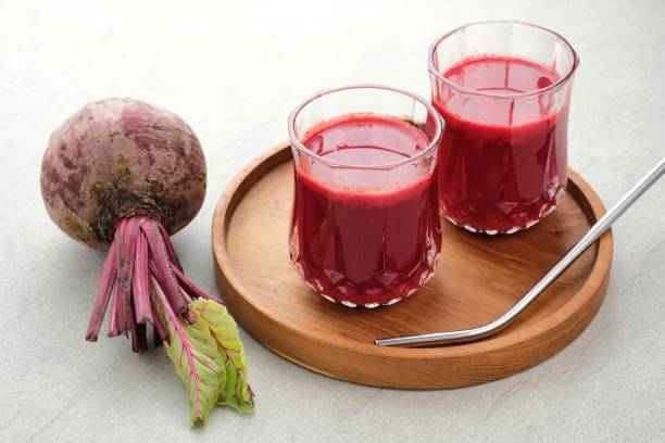 istock Healthy Beetroot juice, served in glass, close up and copy space. 1323324061