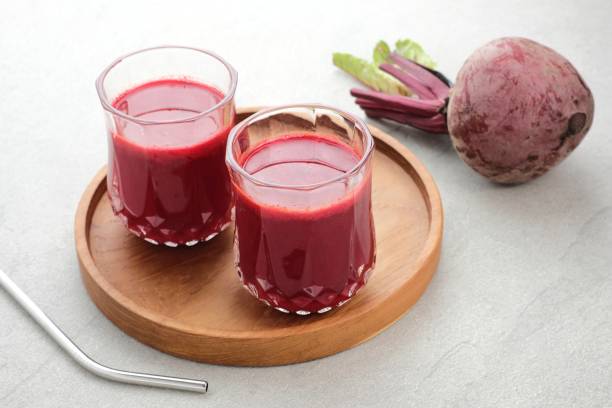 istock Healthy Beetroot juice, served in glass, close up and copy space. 1323324112