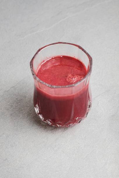 istock Healthy Beetroot juice, served in glass, close up and copy space. 1323324247