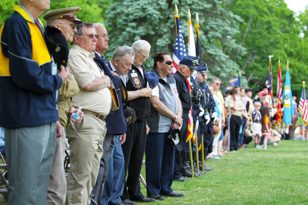 memorial day ceremony held in lexington, ma on tuesday, sunday, may 24, 2015 - american culture army usa flag imagens e fotografias de stock