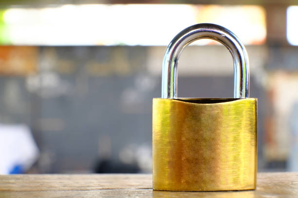 istock Padlock on table background and business security concept, protecting data personal information 1323327068