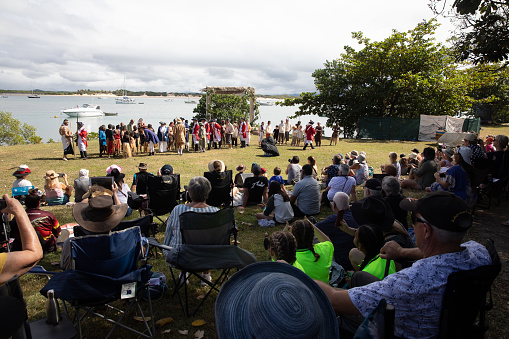 cast shot of group of actors after the perfromace of cook's arrival to australia reencatmnet on the endeavour river cooktown