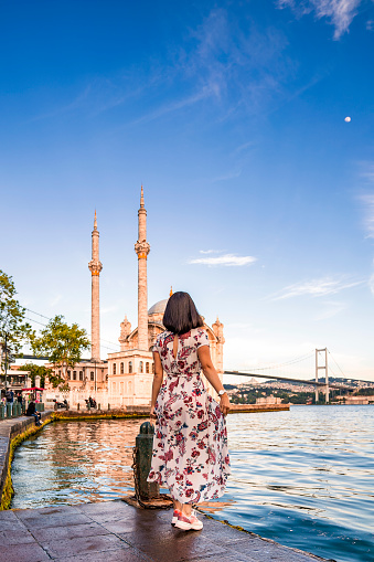 Rear view of young Woman traveling in Istanbul Turkey.