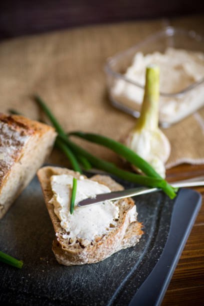 istock Homemade buckwheat bread with garlic cheese spread 1323341271