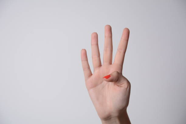 istock Number four Woman Hand, A hand sign gesture 1323341715