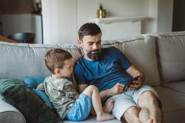 istock Watching cartoons together 1323343126