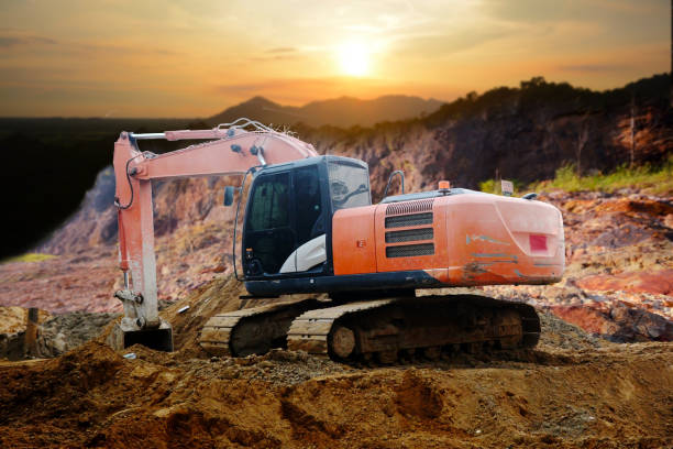 istock construction site digger, excavator and dumper truck. industrial machinery on building site 1323345715