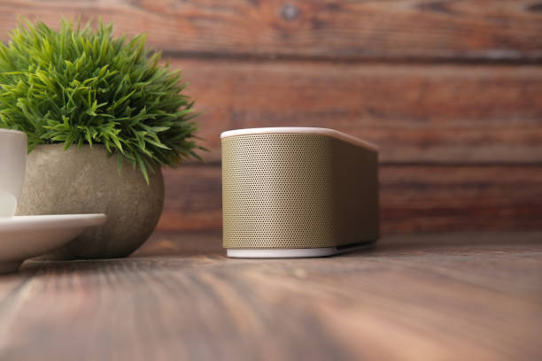 istock smart speaker and keyboard with copy space on white background 1323351039