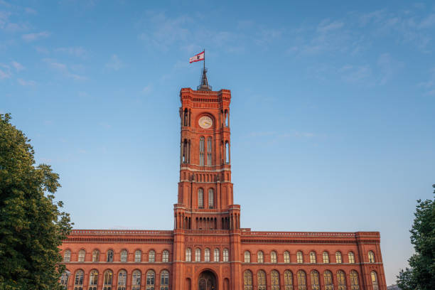 istock Berlin Town Hall (Rotes Rathaus) and Berlin Flag - Berlin, Germany 1323354629
