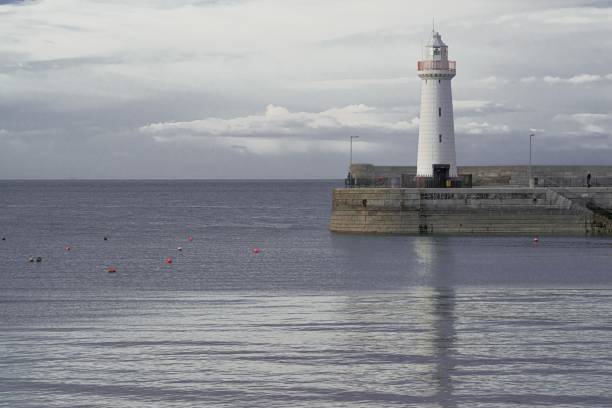 Lighthouse at the quay of Donaghadee Harbour, County Down, Northern Ireland.