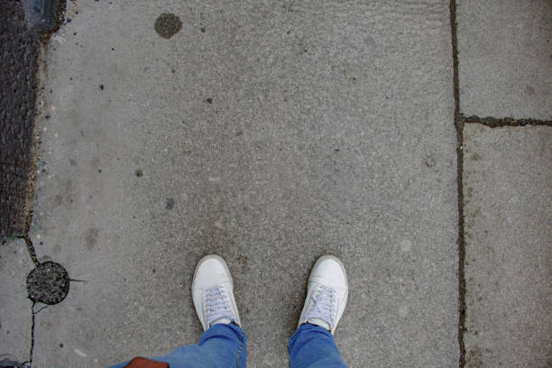 istock Standing on the street pavement 1323356659