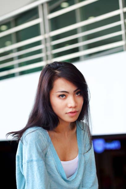 istock Pretty into camera looking filipina transgender 1323357894