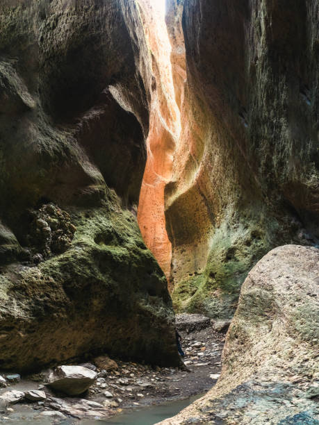 istock Sunlight in a mountain gorge. Karadakh gorge with sunlight in Dagestan. 1323358843