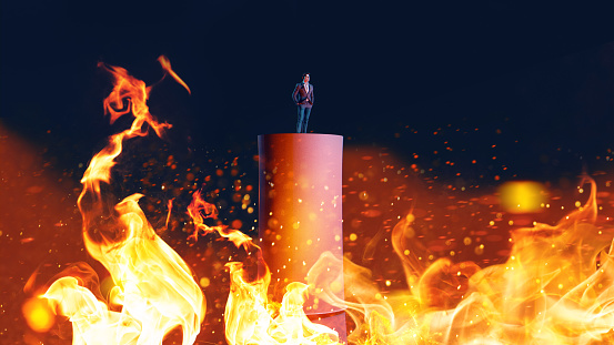 Concept image of burning platform. Man stands still and waits, as flames and fire surrounds the platform. Model is made in 3D with facescanned head.