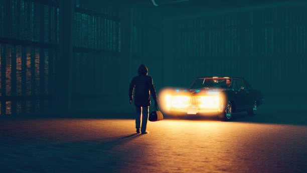 Suspicous meeting at night where a bag is exchanged Concept of a suspicious meeting between two men. They could be criminals, spys or agents. On of the men sits in an old car, and the other one holds a mysterious bag. An exchange is about to take place. vintage car photos stock pictures, royalty-free photos & images