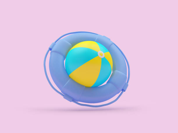 istock Colorful beach ball in a lifebuoy. 1323358975