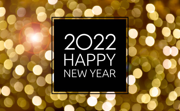 2022 Happy New Year christmas golden bokeh lights background frame stock images 2022 New Year sign on a glowing background. Happy New Year 2022 night defocused lights texture greeting card images 2022 photos stock pictures, royalty-free photos & images
