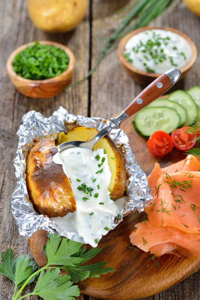 istock Baked potato with salmon 1323363472