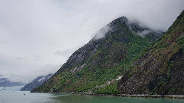 istock clouds over the mountains of Alaska 1323367812