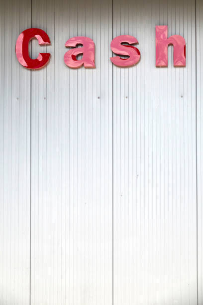 istock Gray wall with single word cash 1323370828
