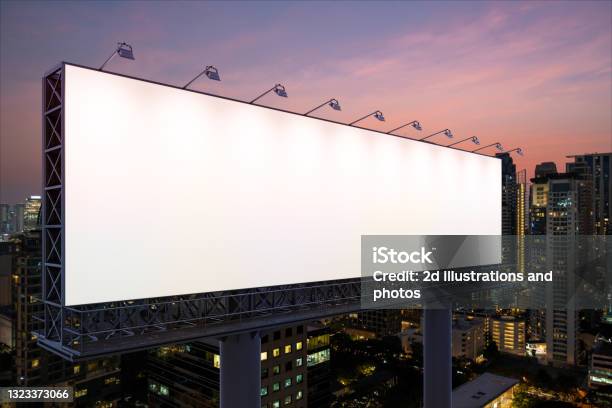 Blank White Road Billboard With Bangkok Cityscape Background At Night Time Street Advertising Poster Mock Up Side View The Concept Of Marketing Communication To Sell Idea Stock Photo - Download Image Now