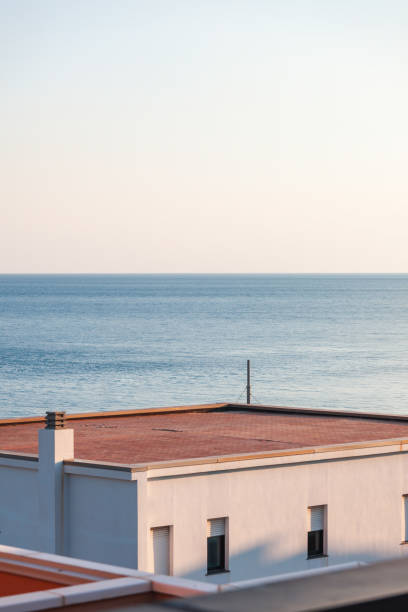 istock View on Mediterranean sea over neighbour roof 1323373389