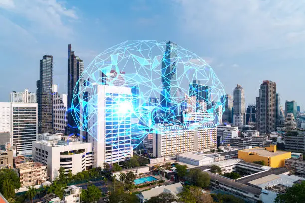 Photo of Brain hologram over panorama city view of Bangkok, the largest science hub in Asia. The concept of developing coding and high-tech science. Double exposure.