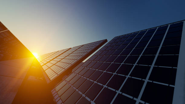 istock Sun Shining Through the Solar Panels Under Clear Sky 1323378387