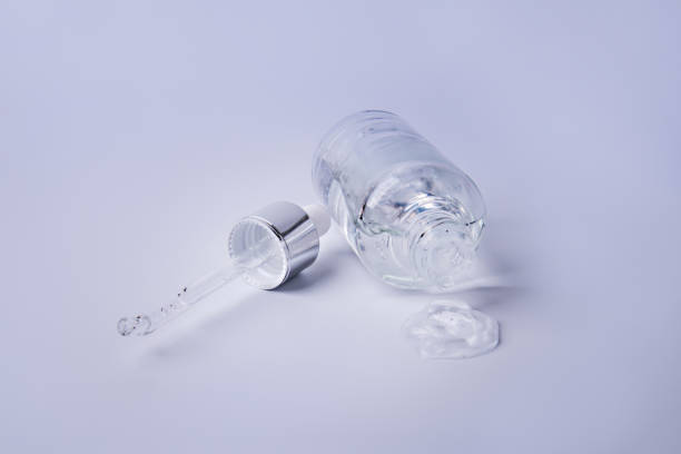 istock Bottle of face serum lay on a white background. 1323380399