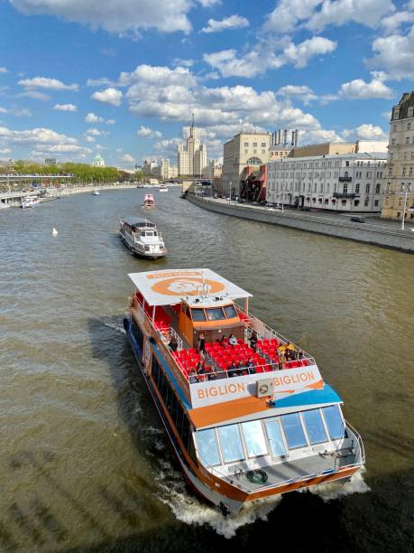 Moscow, Russia, September 29, 2023: The Moskva River with statue of Peter the Great and architecture, cloudy blue sky