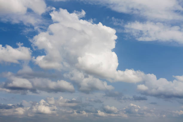 istock Blue sky with clouds on a sunny day. 1323385310