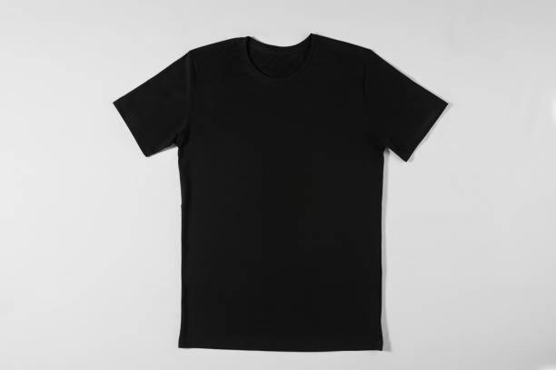 istock Black beautiful T-shirt on a light background 1323385313