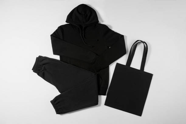 istock Stylish clothing lying on an isolated background 1323385942