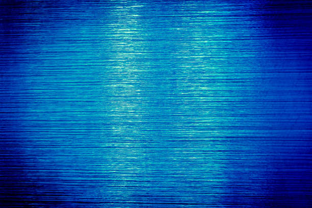 istock Tightly stretched plastic wrap texture, colours alienated 1323390349