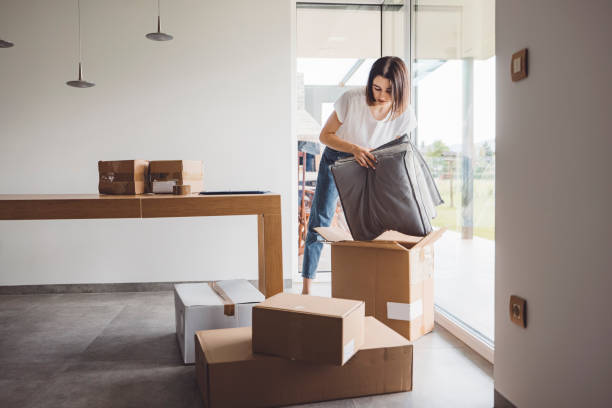 istock Young woman moving into a new apartment 1323390487