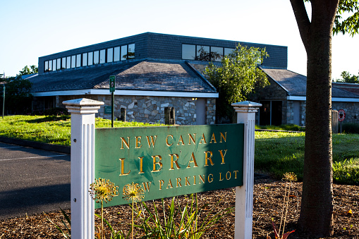 New Canaan, CT, USA- June 13, 2021: New Canaan library building with sign