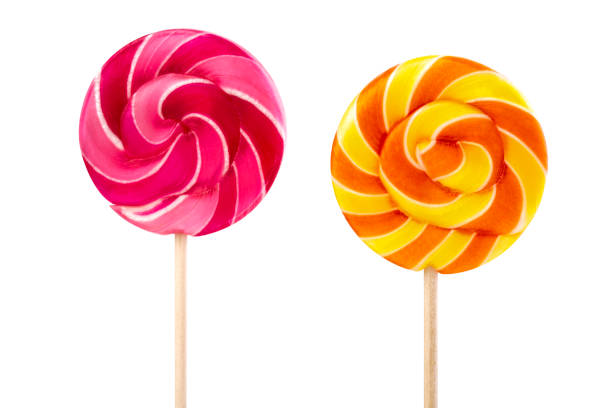 istock Round striped swirling lollipop isolated on white background 1323401106