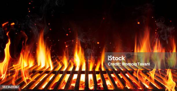 Barbecue Grill With Fire Flames Empty Fire Grid On Black Background Stock Photo - Download Image Now